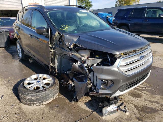 FORD ESCAPE SE 2018 with VIN 1FMCU9GDXJUA27324 - Photo from auction