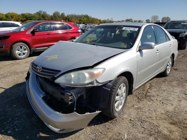 Photo 2 from auction – 2004 TOYOTA CAMRY LE with VIN 4T1BF30K94U065367