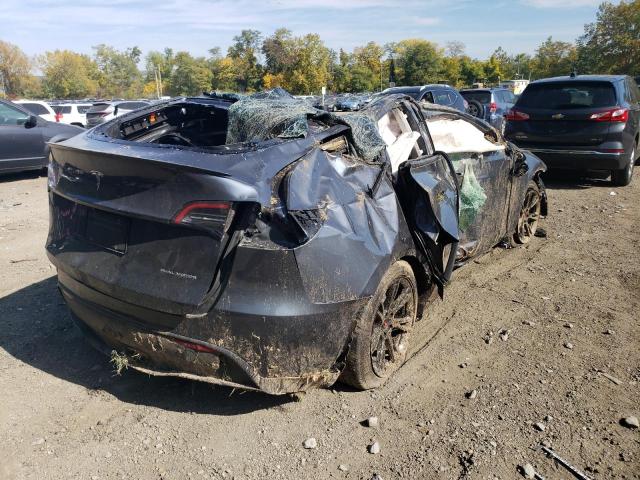 Photo 4 from auction – 2021 TESLA MODEL Y with VIN 5YJYGDEE5MF118725