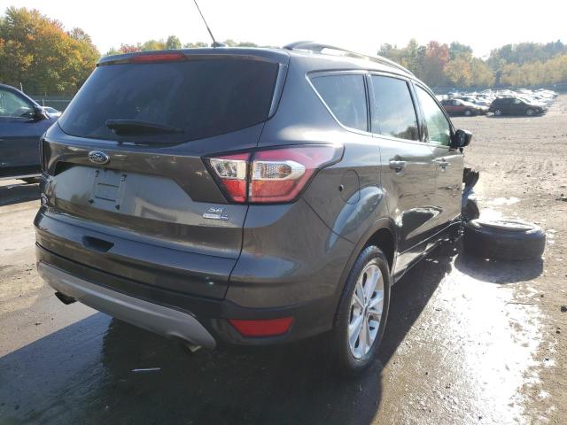 Photo 4 from auction – 2018 FORD ESCAPE SE with VIN 1FMCU9GDXJUA27324