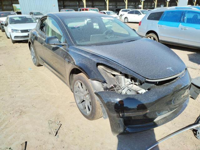 Photo 4 from auction – 2021 TESLA MODEL 3 with VIN 5YJ3E1EA4MF095336