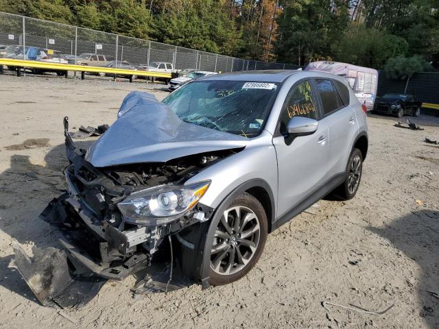 Photo 2 from auction – 2016 MAZDA CX-5 GT with VIN JM3KE2DY6G0709488