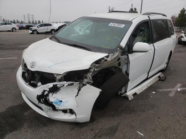 Photo 2 from auction – 2014 TOYOTA SIENNA LE with VIN 5TDKK3DC0ES445884