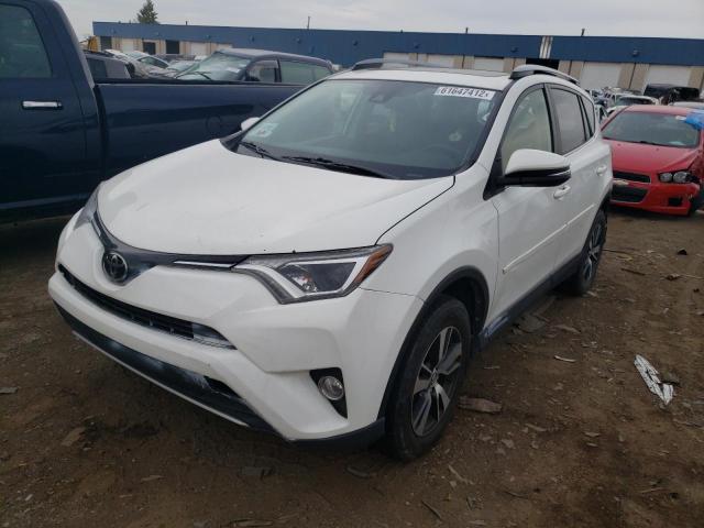 Photo 2 from auction – 2017 TOYOTA RAV4 XLE with VIN JTMRFREV2HD211039
