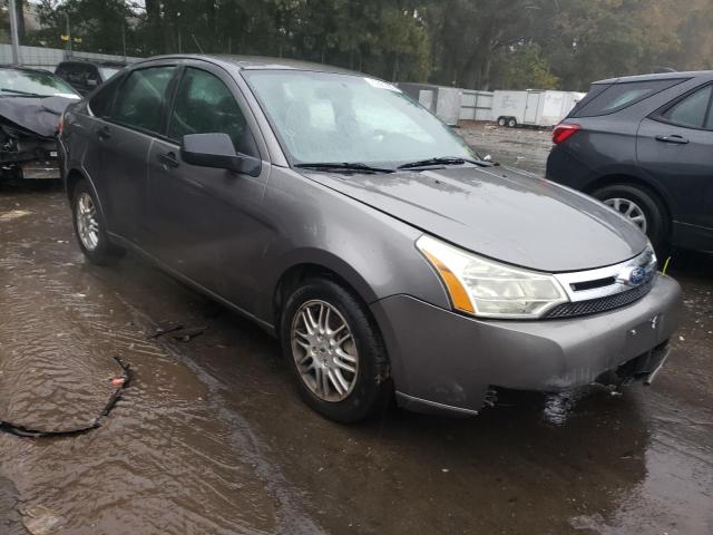 FORD FOCUS SE 2011 with VIN 1FAHP3FN1BW135738 - Photo from auction