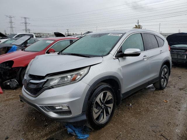 Photo 2 from auction – 2016 HONDA CR-V TOURI with VIN 5J6RM3H90GL011261