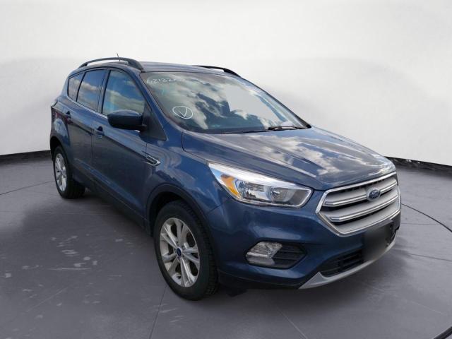 FORD ESCAPE SE 2018 with VIN 1FMCU9GD0JUA29650 - Photo from auction