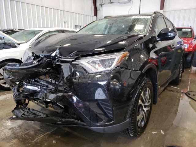 Photo 2 from auction – 2016 TOYOTA RAV4 LE with VIN 2T3BFREV0GW477968
