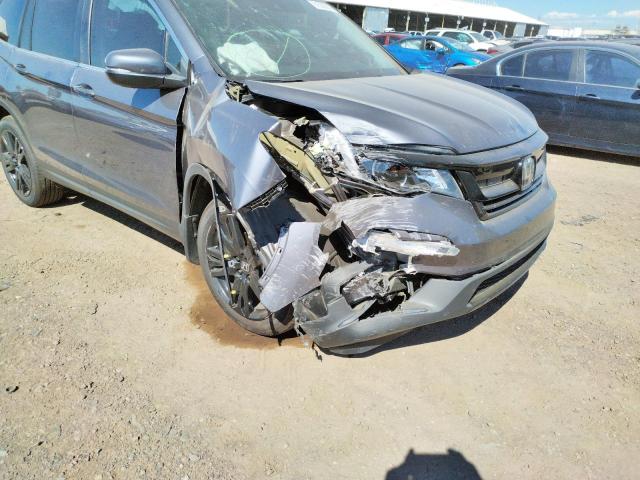 Photo 9 from auction – 2022 HONDA PILOT SE with VIN 5FNYF6H2XNB027340