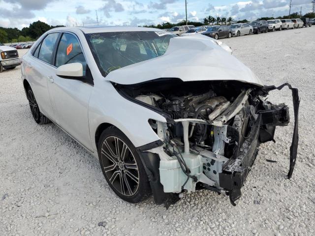 TOYOTA CAMRY LE 2016 with VIN 4T1BF1FKXGU509565 - Photo from auction