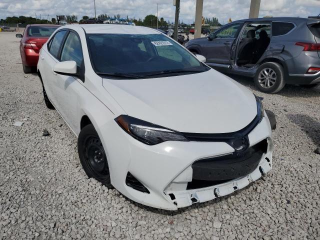 TOYOTA COROLLA L 2019 with VIN 5YFBURHE5KP887346 - Photo from auction