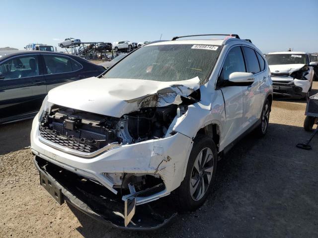Photo 2 from auction – 2016 HONDA CR-V TOURI with VIN 5J6RM4H93GL120643