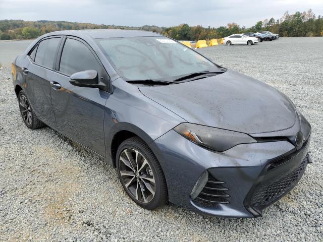 TOYOTA COROLLA SE 2018 with VIN 5YFBURHEXJP831997 - Photo from auction