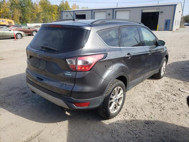 Photo 4 from auction – 2018 FORD ESCAPE SE with VIN 1FMCU0GD2JUB16039