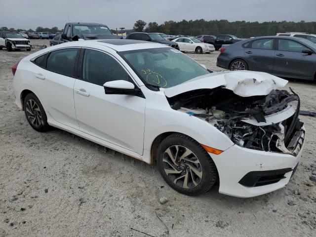HONDA CIVIC EX 2018 with VIN 19XFC2F74JE037580 - Photo from auction