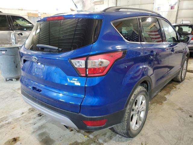 Photo 4 from auction – 2018 FORD ESCAPE SE with VIN 1FMCU9GD7JUA30133