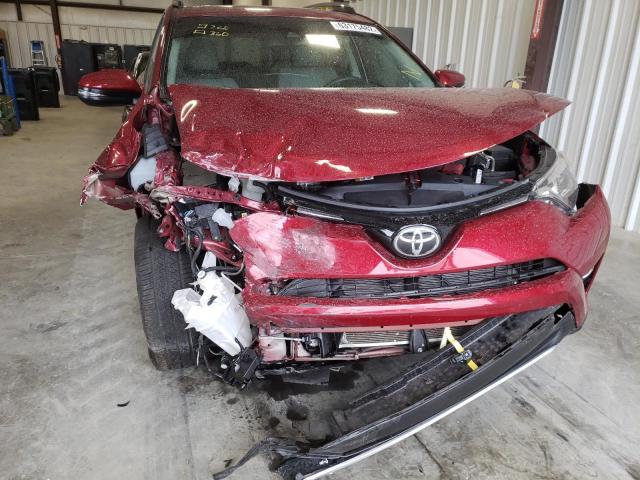 Photo 9 from auction – 2018 TOYOTA RAV4 LIMIT with VIN 2T3YFREV0JW515863