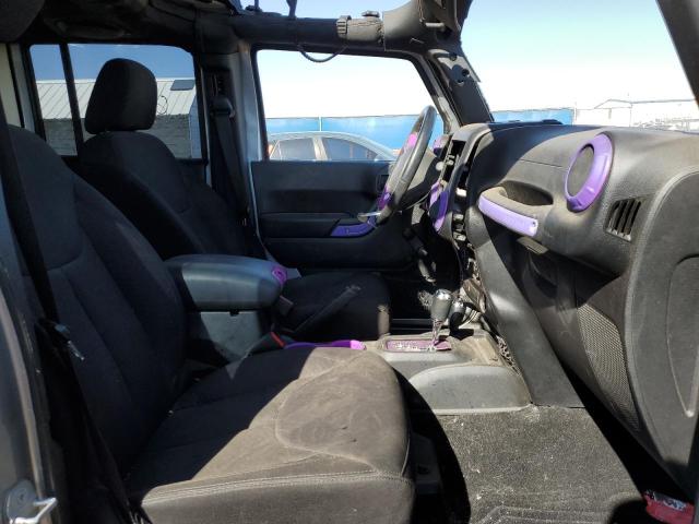 Photo 5 from auction – 2014 JEEP WRANGLER U with VIN 1C4BJWDG1EL156599