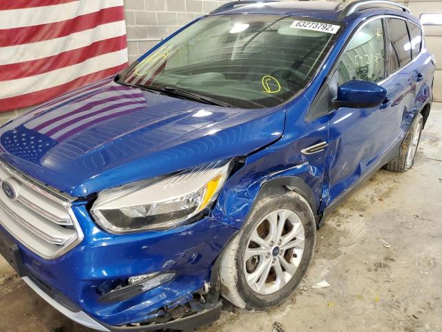 Photo 9 from auction – 2018 FORD ESCAPE SE with VIN 1FMCU9GD7JUA30133