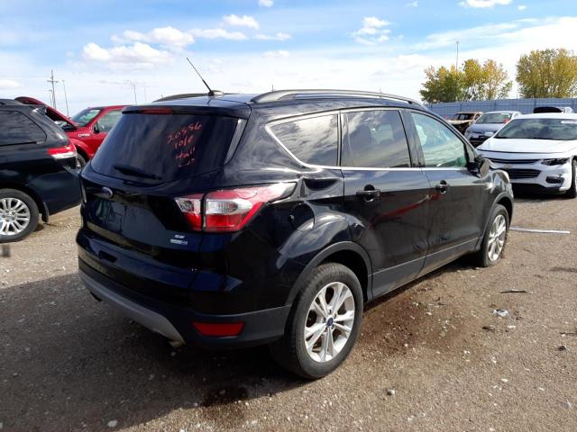 Photo 4 from auction – 2017 FORD ESCAPE SE with VIN 1FMCU9GD4HUD53288