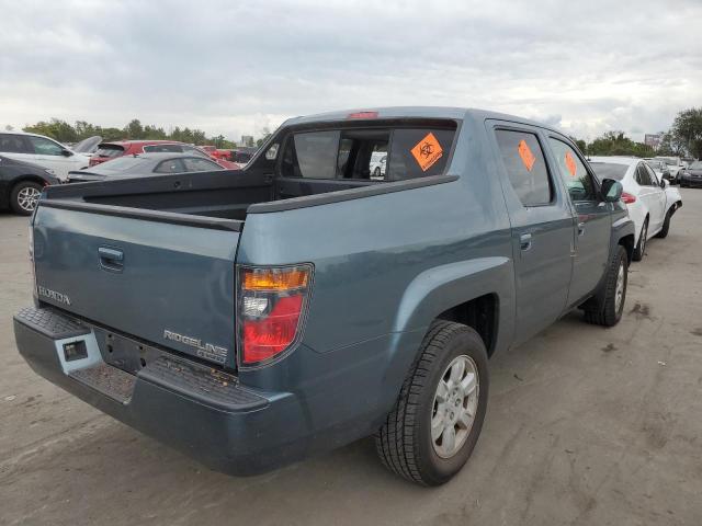 Photo 4 from auction – 2006 HONDA RIDGELINE with VIN 2HJYK16576H522355