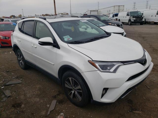 TOYOTA RAV4 XLE 2017 with VIN JTMRFREV2HD211039 - Photo from auction