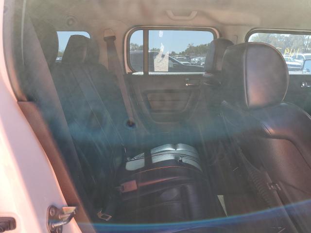 Photo 6 from auction – 2006 HUMMER H3 with VIN 5GTDN136268286767