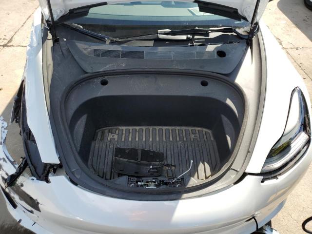 Photo 7 from auction – 2022 TESLA MODEL 3 with VIN 5YJ3E1EB0NF265377
