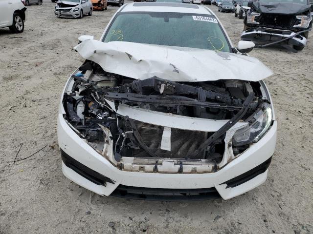 Photo 9 from auction – 2018 HONDA CIVIC EX with VIN 19XFC2F74JE037580