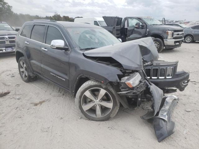 JEEP GRAND CHER 2014 with VIN 1C4RJECT5EC330911 - Photo from auction