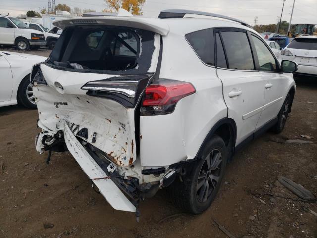 Photo 4 from auction – 2017 TOYOTA RAV4 XLE with VIN JTMRFREV2HD211039