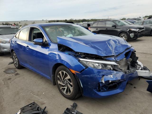 Photo 1 from auction – 2018 HONDA CIVIC EX with VIN 19XFC2F70JE034417