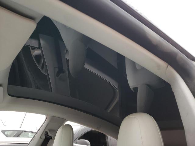 Photo 9 from auction – 2021 TESLA MODEL Y with VIN 5YJYGDEEXMF247947
