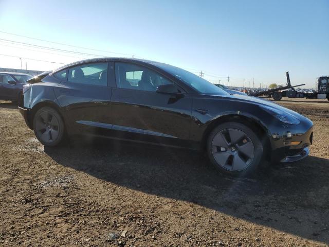 Photo 4 from auction – 2022 TESLA MODEL 3 with VIN 5YJ3E1EA4NF184812