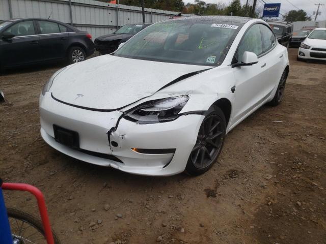 Photo 9 from auction – 2021 TESLA MODEL 3 with VIN 5YJ3E1EA4MF090668