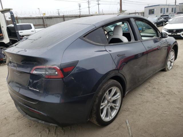 Photo 4 from auction – 2021 TESLA MODEL Y with VIN 5YJYGDEEXMF247947
