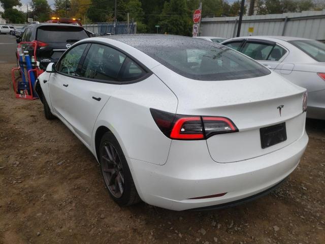 Photo 3 from auction – 2021 TESLA MODEL 3 with VIN 5YJ3E1EA4MF090668