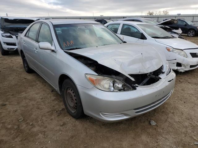 TOYOTA CAMRY LE 2002 with VIN 4T1BF30KX2U023271 - Photo from auction