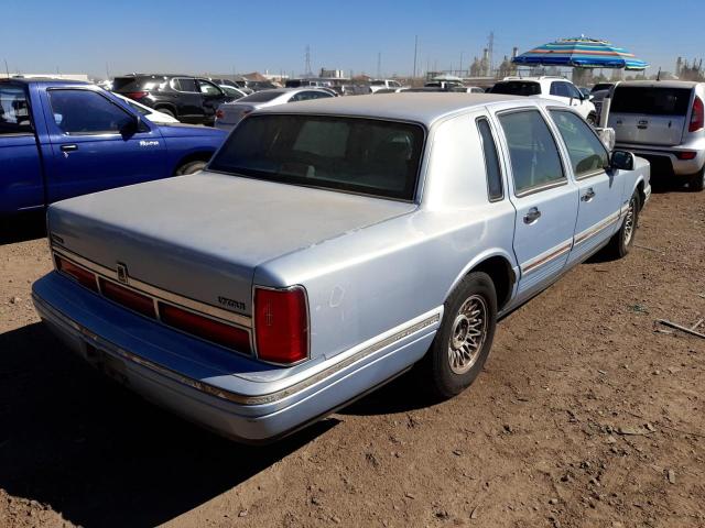 Photo 4 from auction – 1997 LINCOLN TOWN CAR E with VIN 1LNLM81W1VY747503