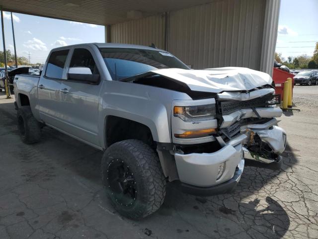 CHEVROLET SILVERADO 2018 with VIN 3GCUKREC4JG477577 - Photo from auction