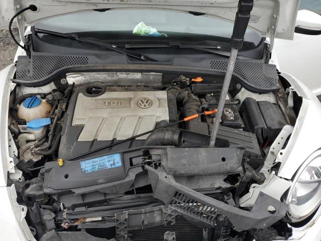 Photo 7 from auction – 2014 VOLKSWAGEN BEETLE with VIN 3VW5L7AT7EM819538