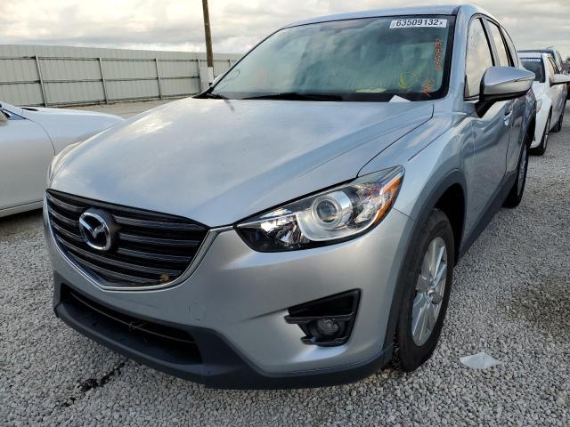 Photo 2 from auction – 2016 MAZDA CX-5 TOURI with VIN JM3KE2CY1G0909678