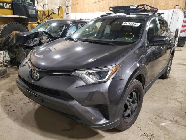 Photo 2 from auction – 2017 TOYOTA RAV4 LE with VIN JTMBFREV8HJ144997