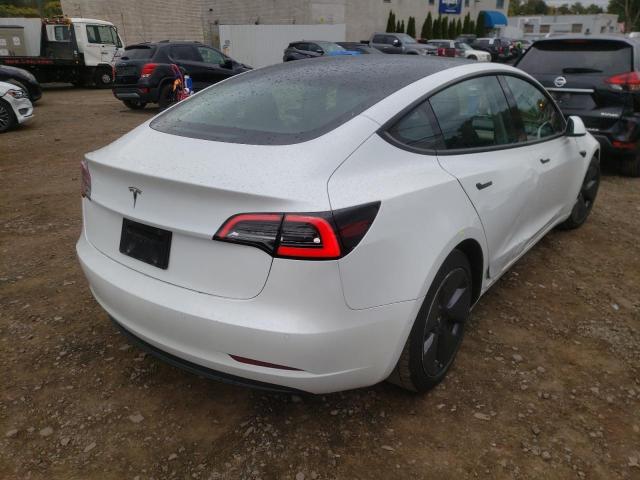 Photo 4 from auction – 2021 TESLA MODEL 3 with VIN 5YJ3E1EA4MF090668