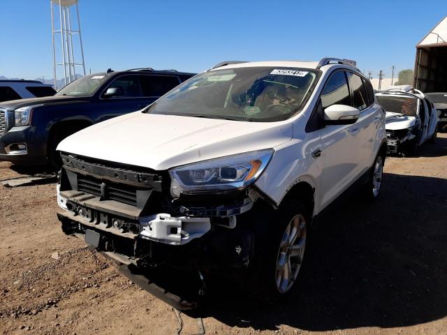 Photo 2 from auction – 2018 FORD ESCAPE TIT with VIN 1FMCU0J96JUC09456