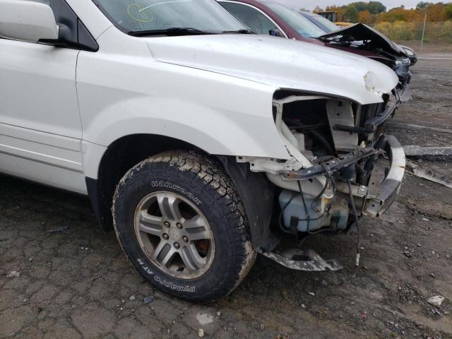 Photo 9 from auction – 2004 HONDA PILOT EX with VIN 5FNYF18494B001542