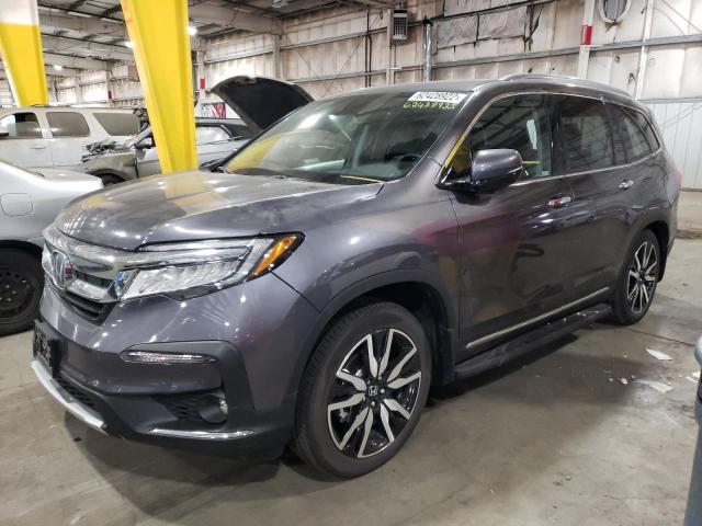 Photo 2 from auction – 2022 HONDA PILOT TOUR with VIN 5FNYF6H93NB020503