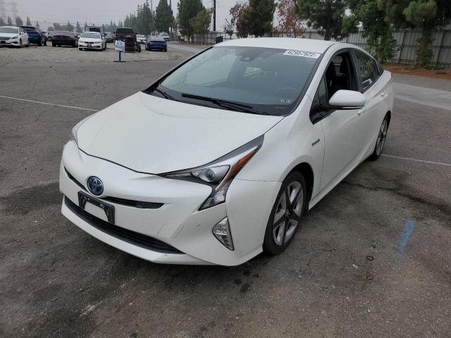 Photo 2 from auction – 2016 TOYOTA PRIUS with VIN JTDKARFU3G3014097