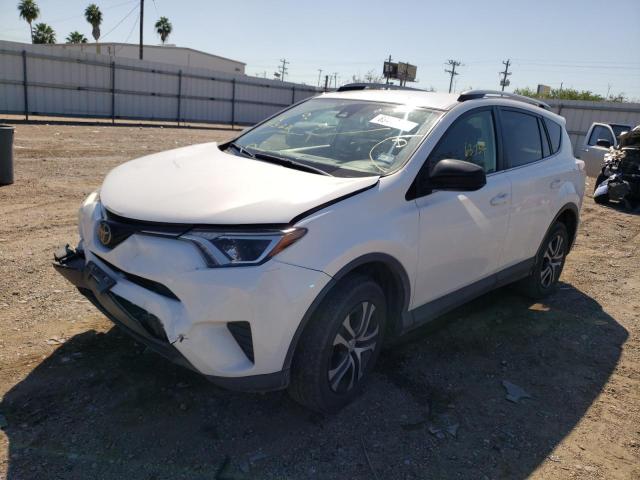 Photo 2 from auction – 2018 TOYOTA RAV4 LE with VIN JTMZFREVXJD129369