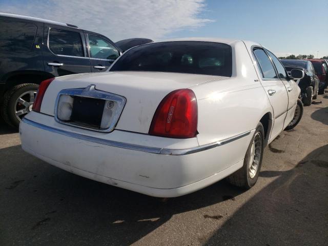 Photo 4 from auction – 2001 LINCOLN TOWN CAR E with VIN 1LNHM81W81Y684254